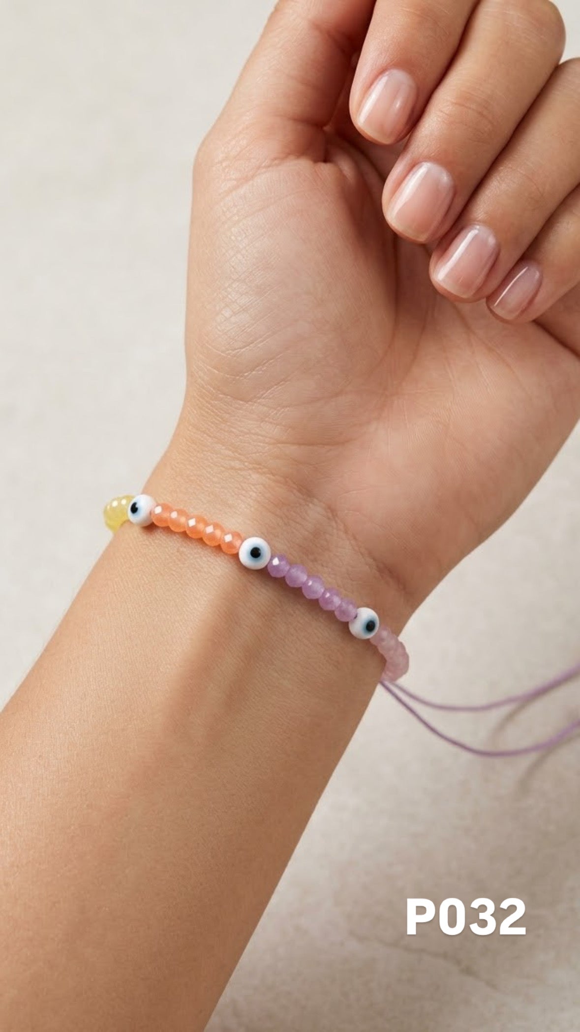 Pulsera ojitos colores claros