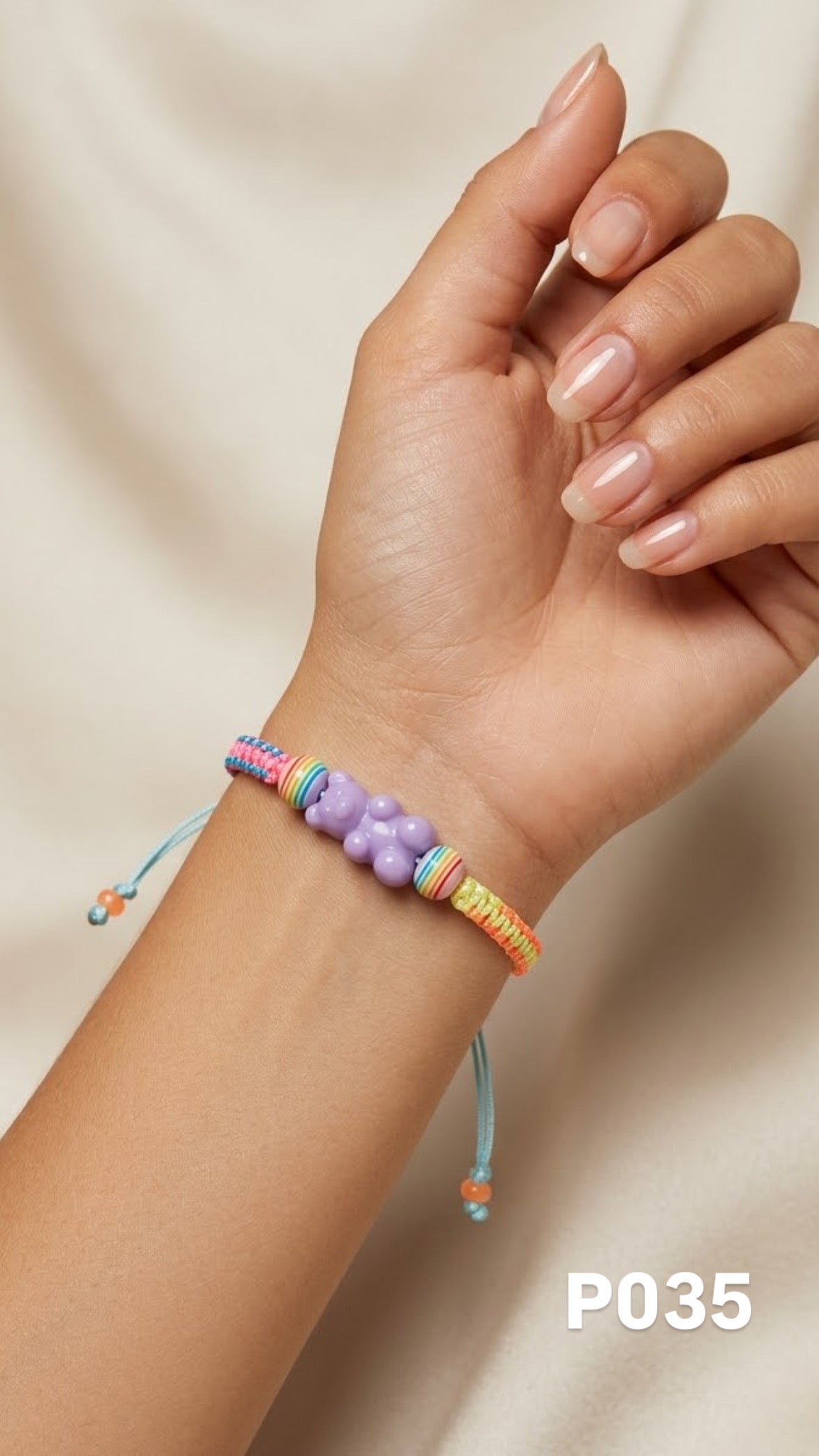 Pulsera osito lila macrame
