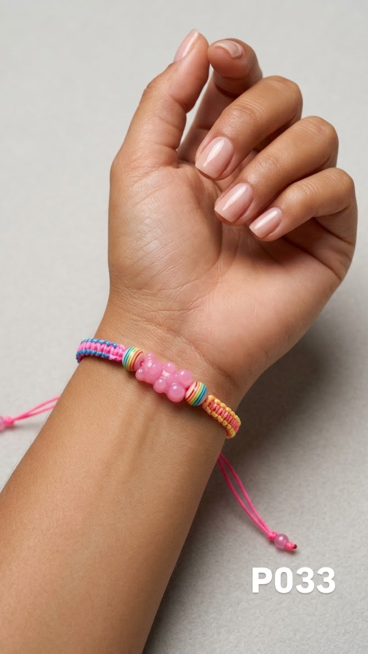 Pulsera osito rosa macrame