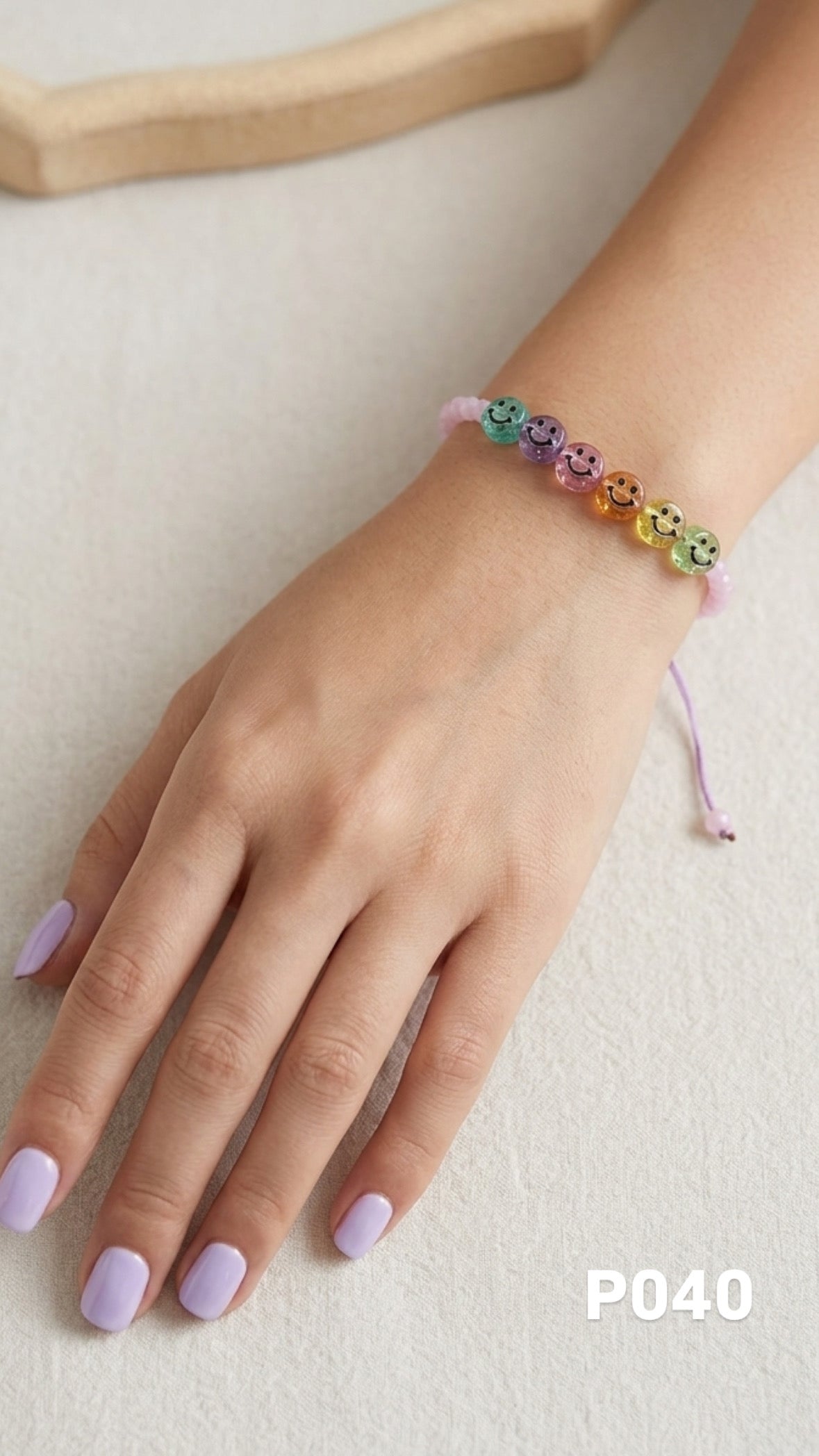 Pulsera caritas colores rosa