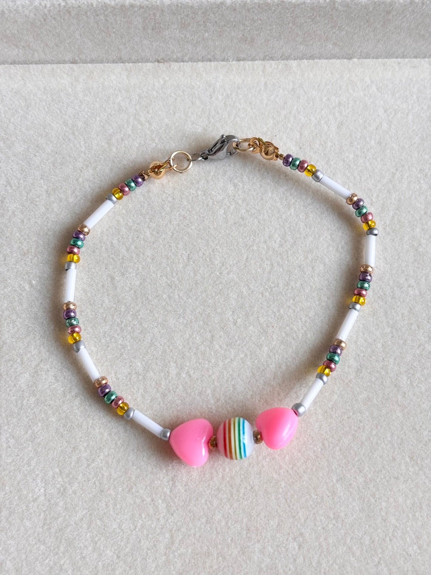 Pulsera corazones rosado