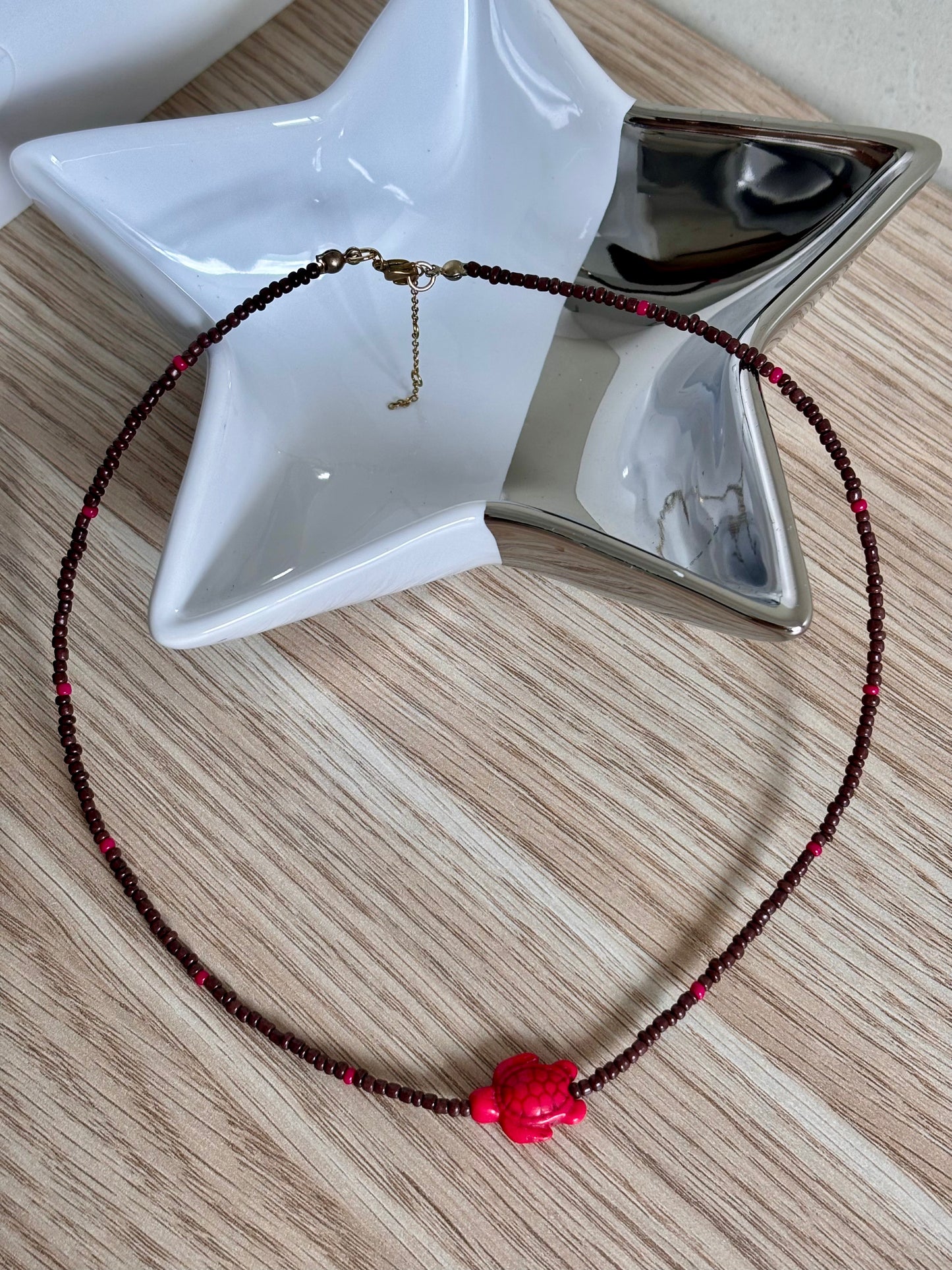 Collar tortuga fucsia