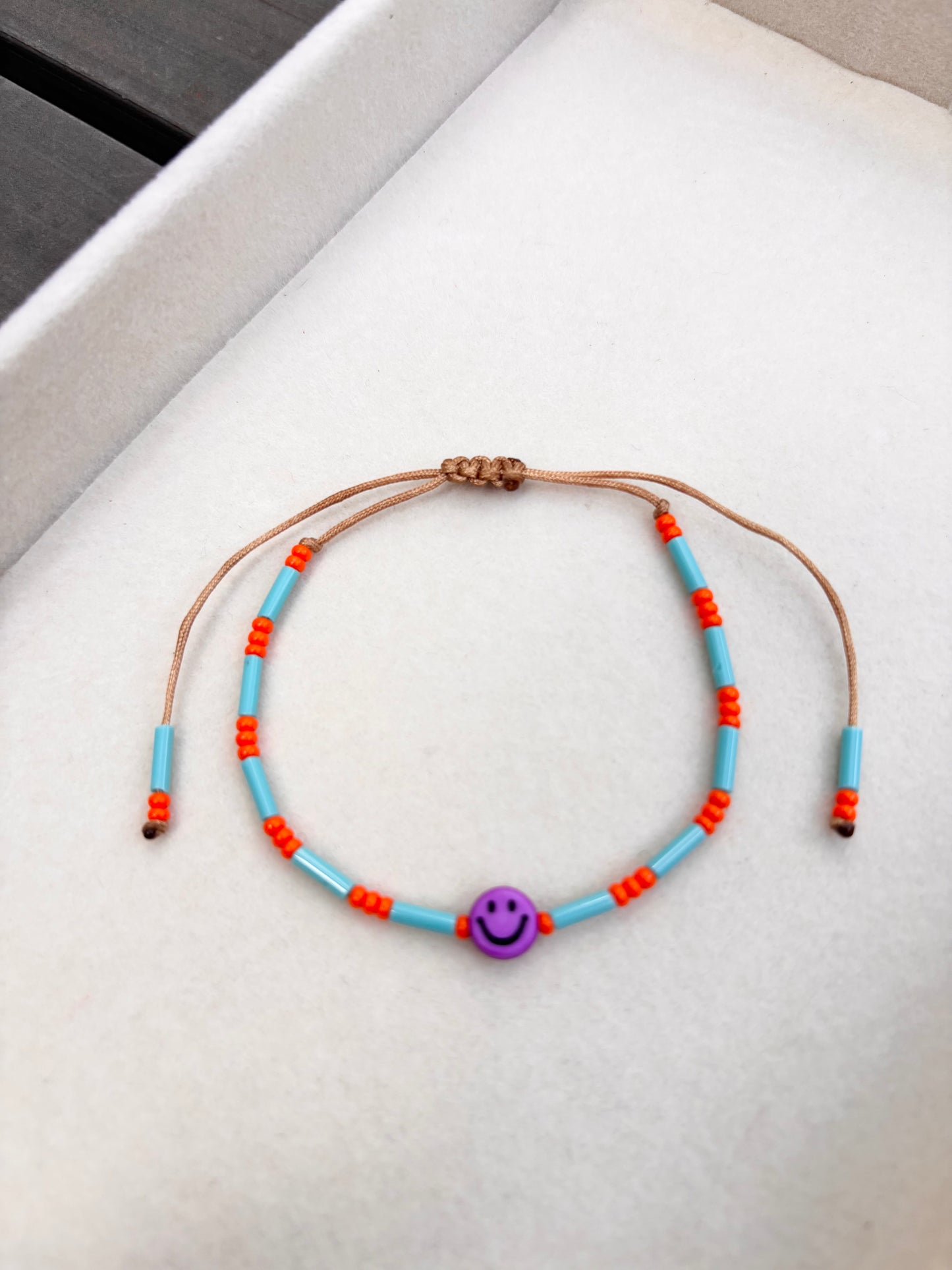 Pulsera carita coqueta