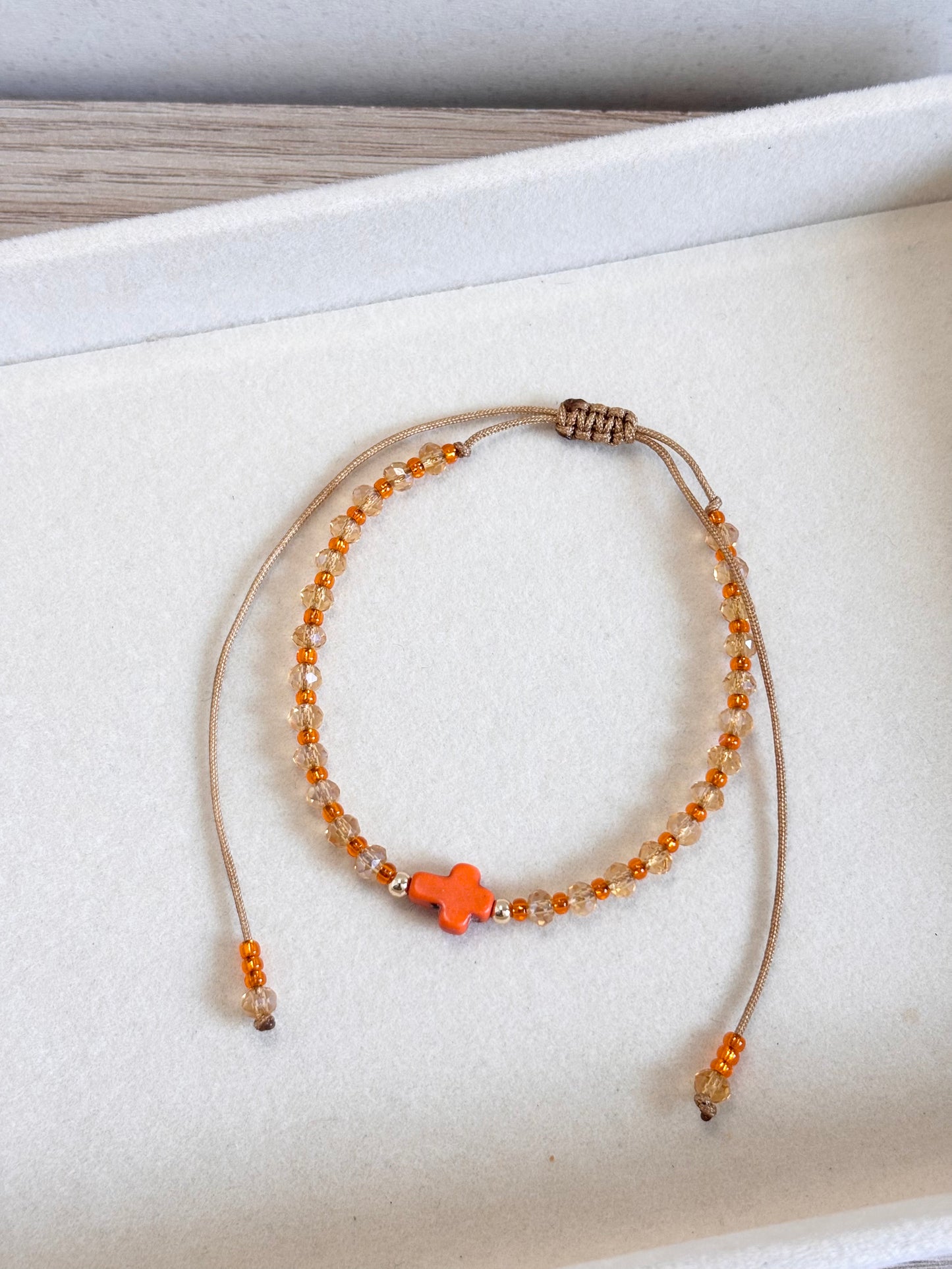 Pulsera cruz naranja