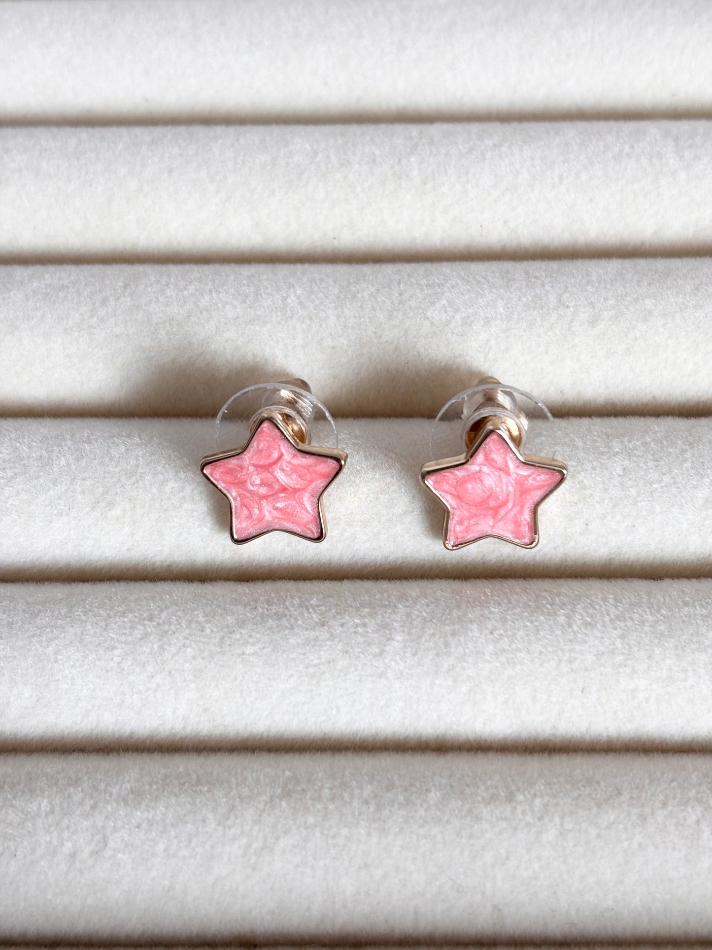 Aretes estrella rosa