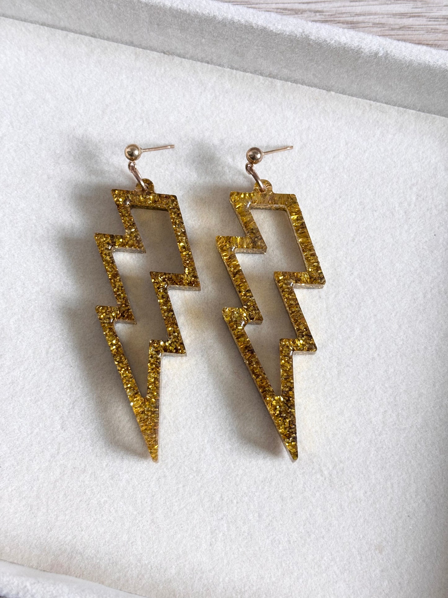 Aretes rayo