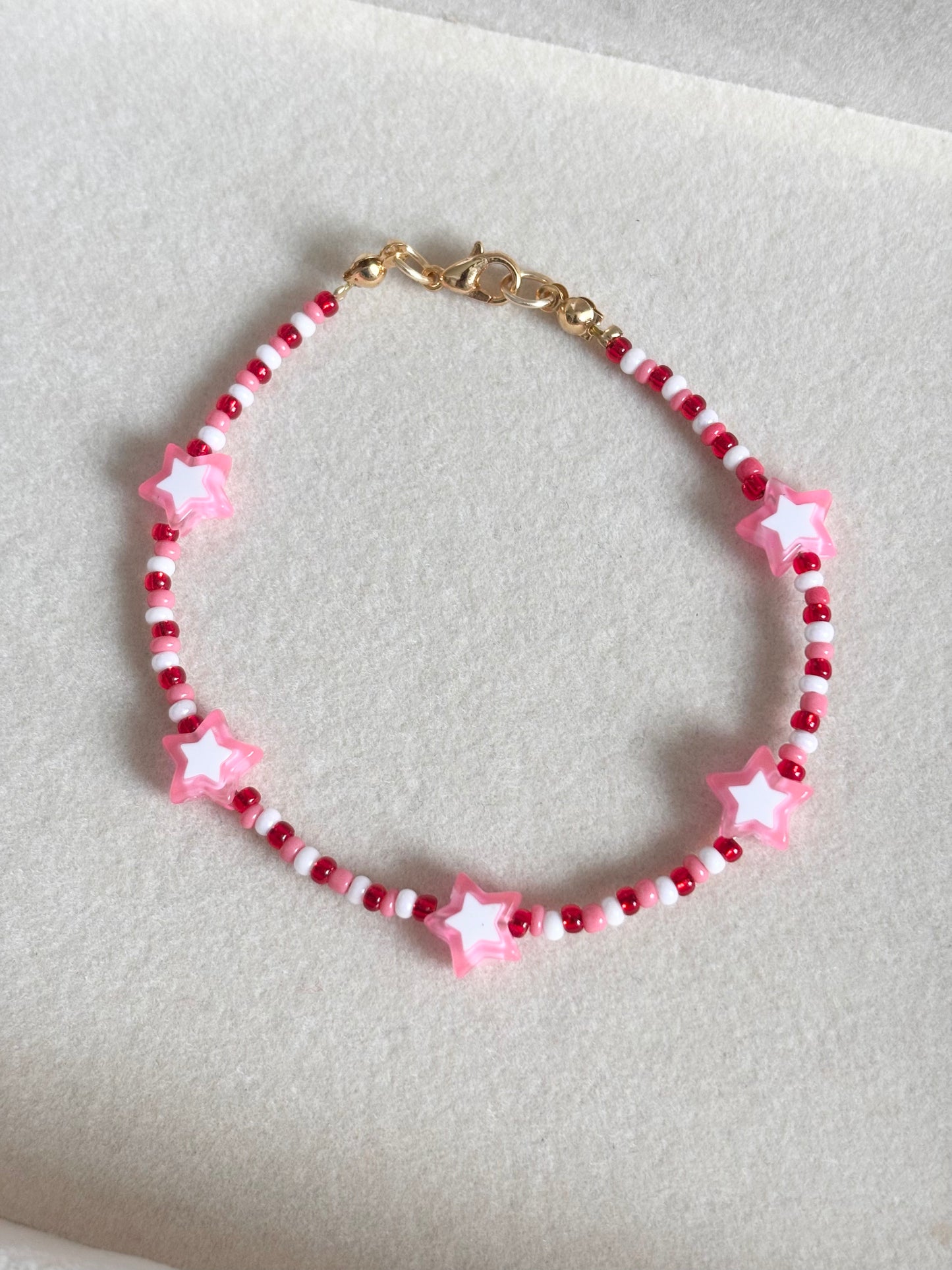 Pulsera estrellas rosadas