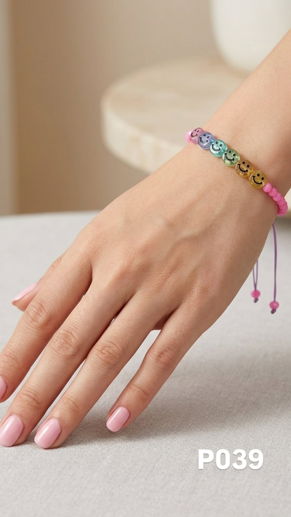 Pulsera caritas colores fucsia