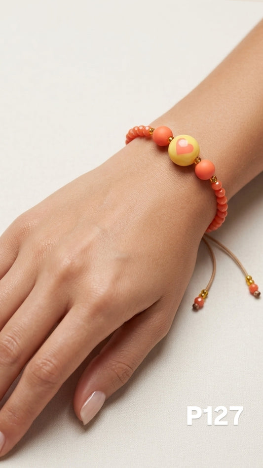 Pulsera bola corazon naranja