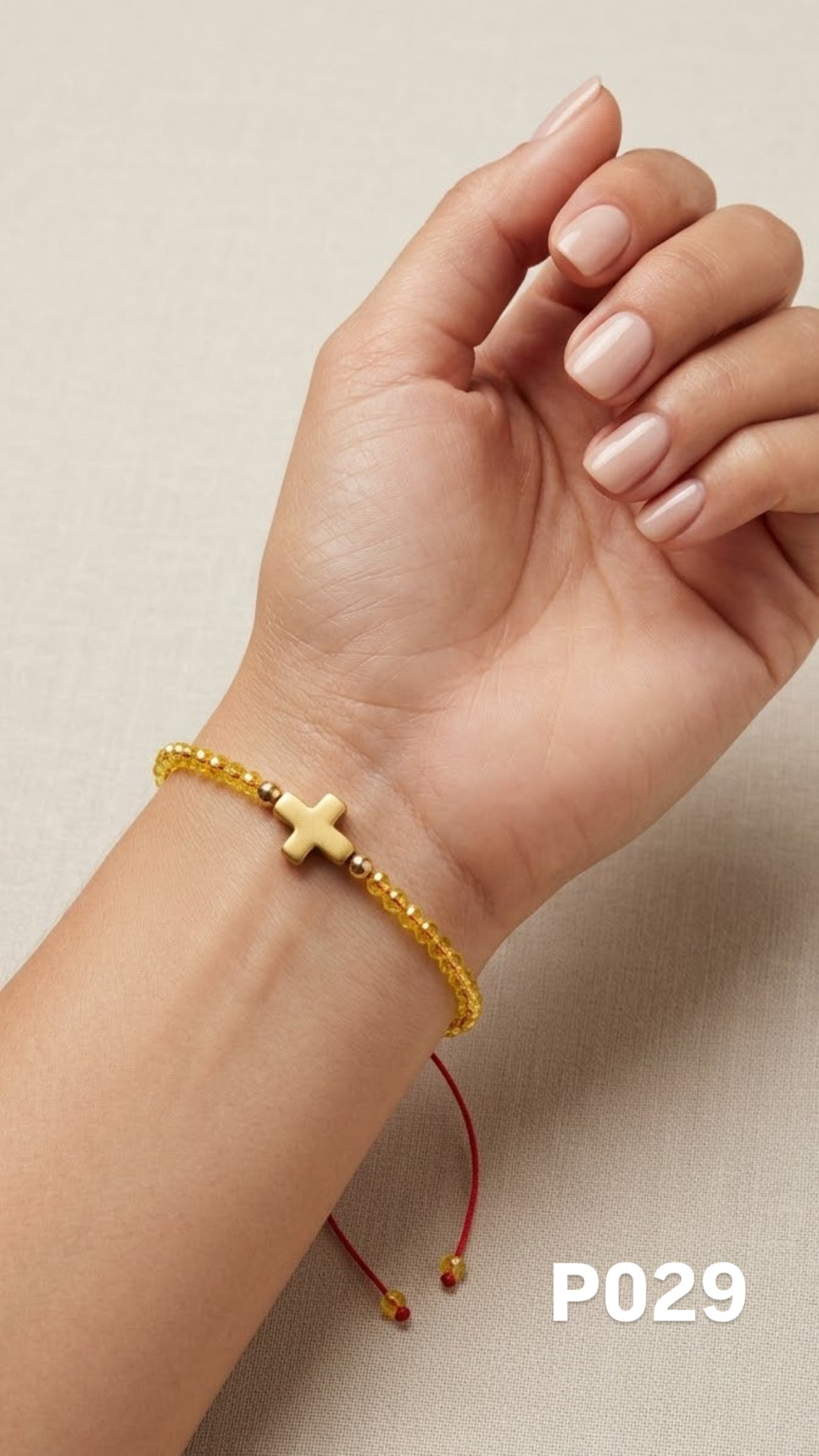 Pulsera cruz amarilla
