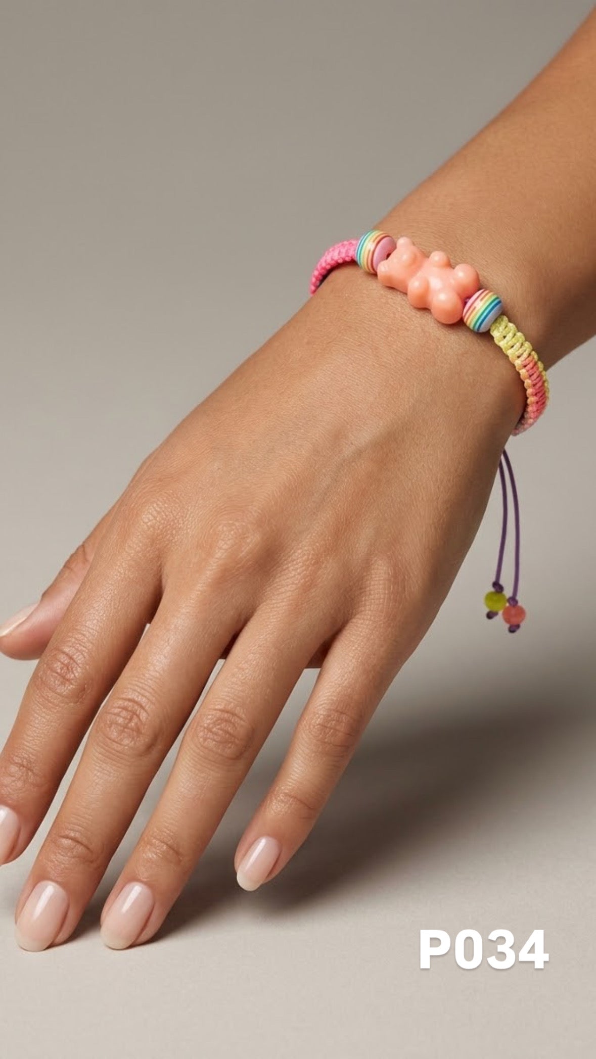 Pulsera osito naranja macrame