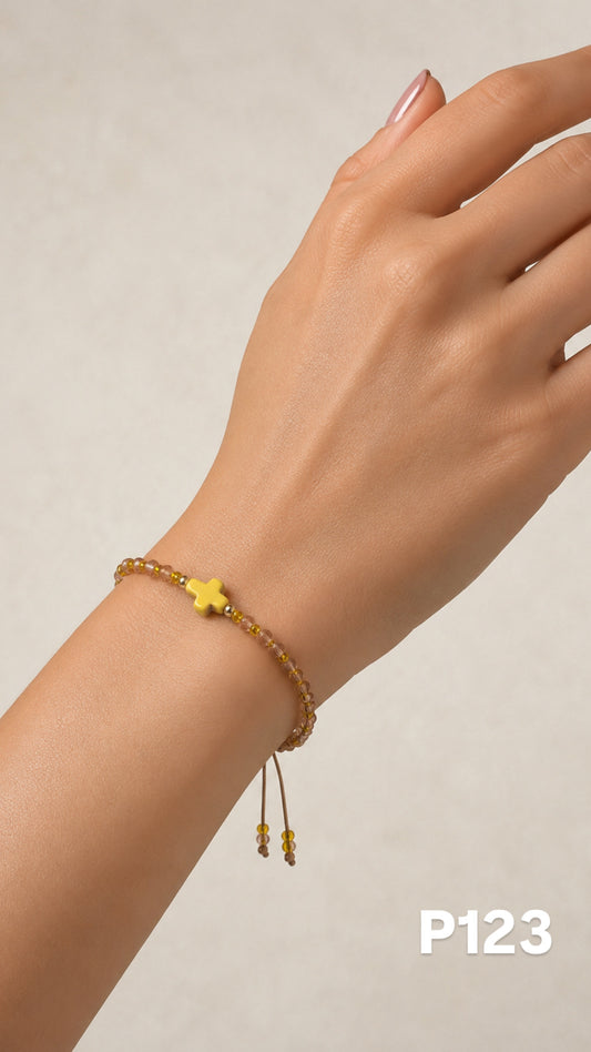 Pulsera cruz amarilla