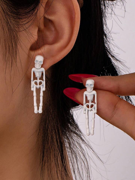 Aretes esqueletos fluorescentes blanco