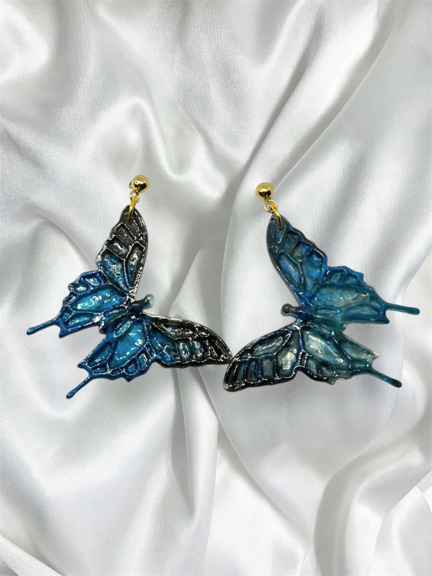 Aretes mariposa azul