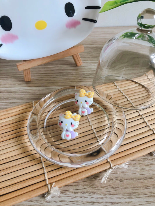 Aretes Hello Kitty violeta